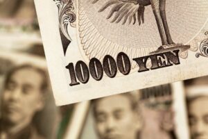 USD/JPY dips to test a previous top at 156.60 following hot Japanese inflation