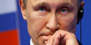 Putin tells Russians there’s no reason to panic as the ruble sinks, but analysts say its economy is in trouble