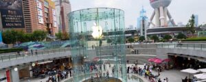 Apple Taps Alibaba For AI, Real Estate Developers Surge