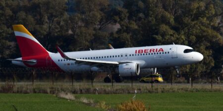 A passenger hit a flight attendant, opened an emergency exit, and jumped out of a plane as it headed to the runway