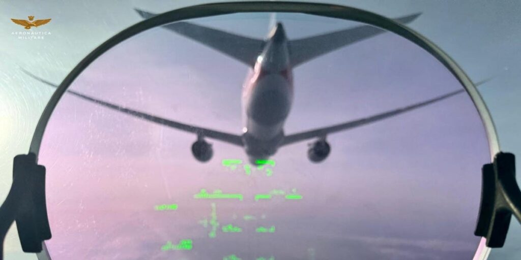 Midair photos show fighter jets scrambled to escort an American Airlines plane after a bomb threat