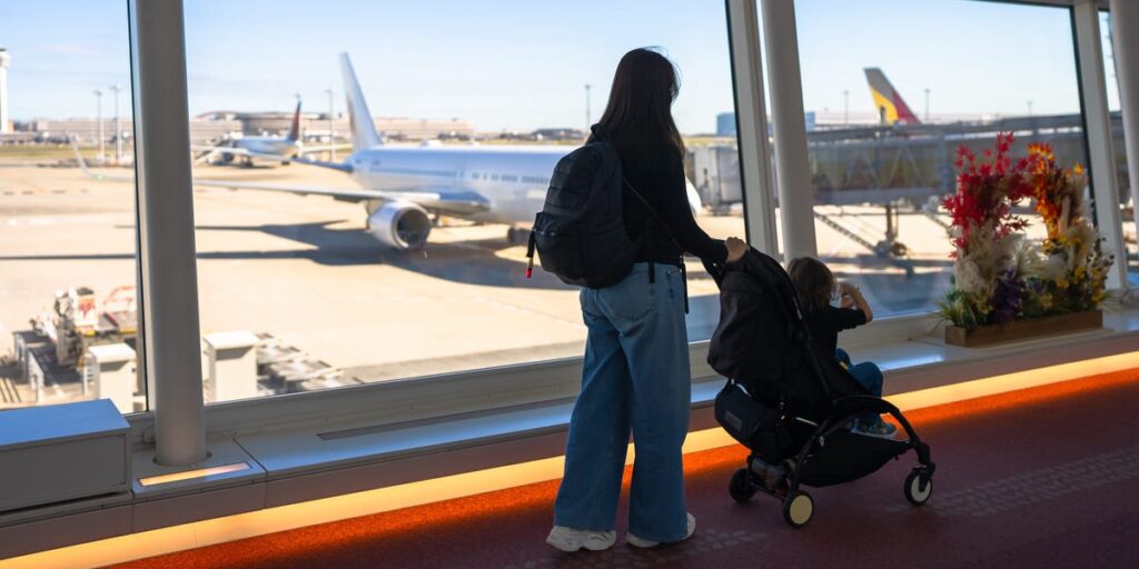 A gate agent refused to let me board a flight with my crying toddler. Another mother came to the rescue.