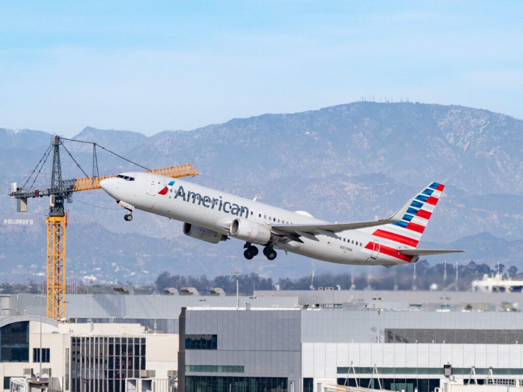 An American Airlines plane was engulfed in plumes of black smoke after an ‘engine-related issue’ at Denver airport