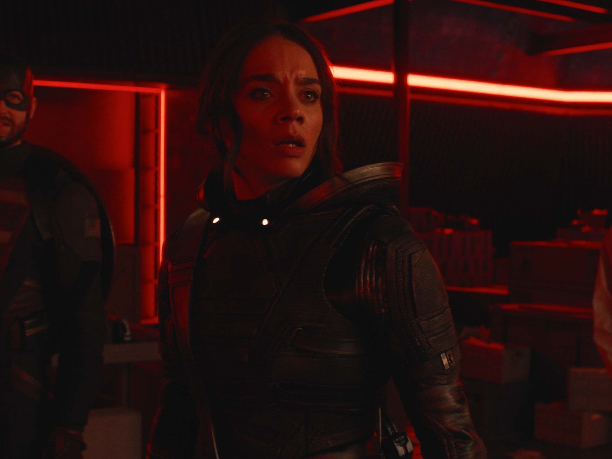A still of "Thunderbolts*" showing a woman and two men wearing superhero clothing.