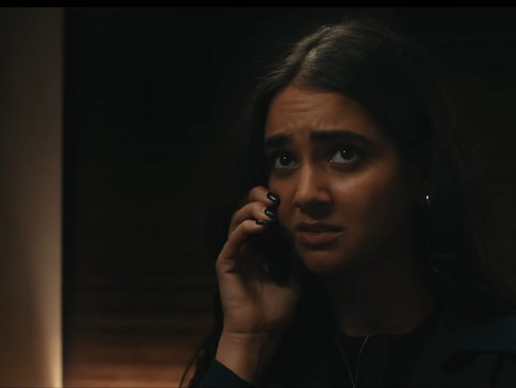 A still of "Thunderbolts*" showing Geraldine Viswanathan speaking on a mobile.