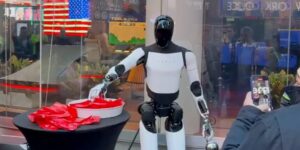 Tesla’s Optimus Robot Hands Out Candy in Times Square