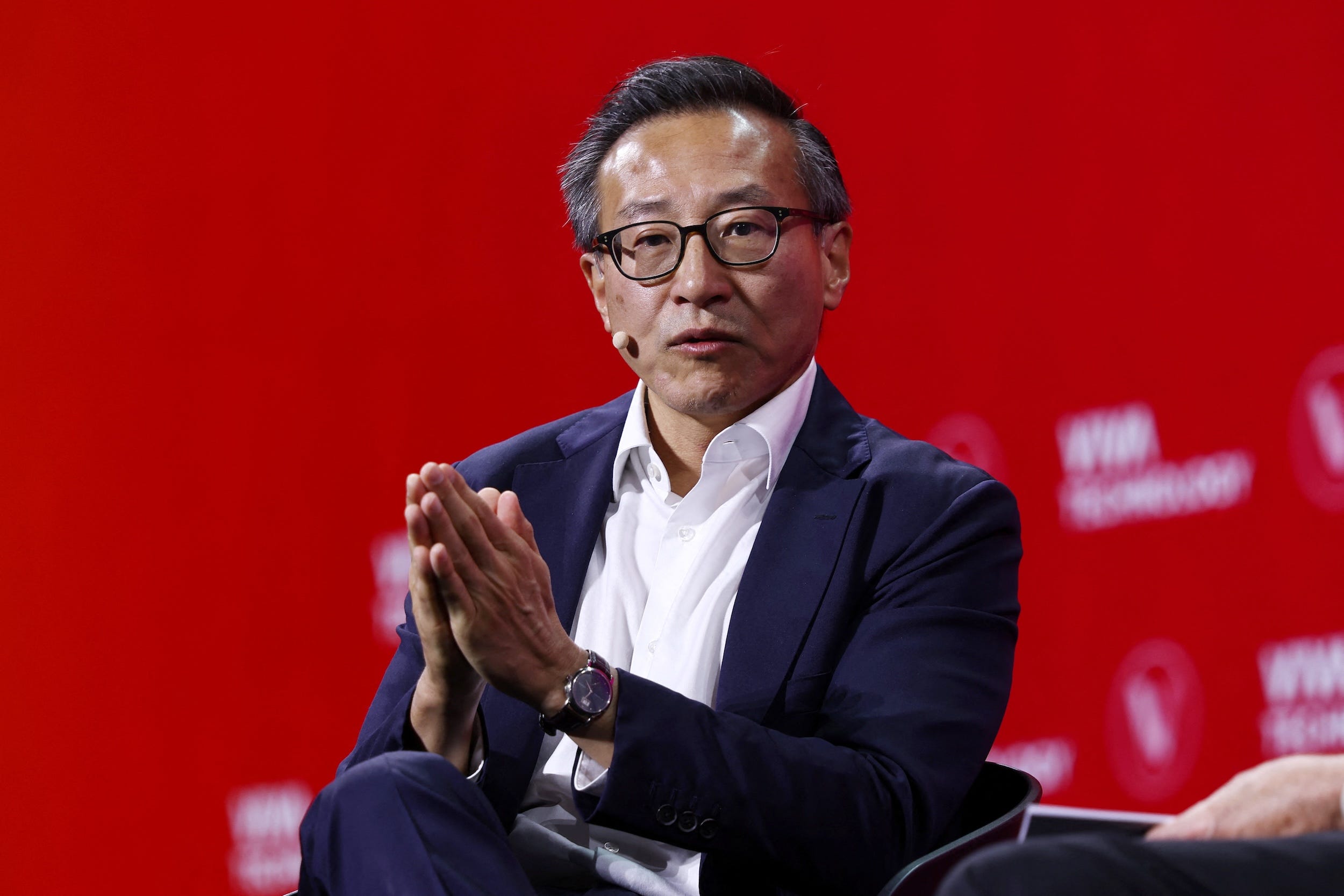 Jos Tsai speaks at a conference in Paris