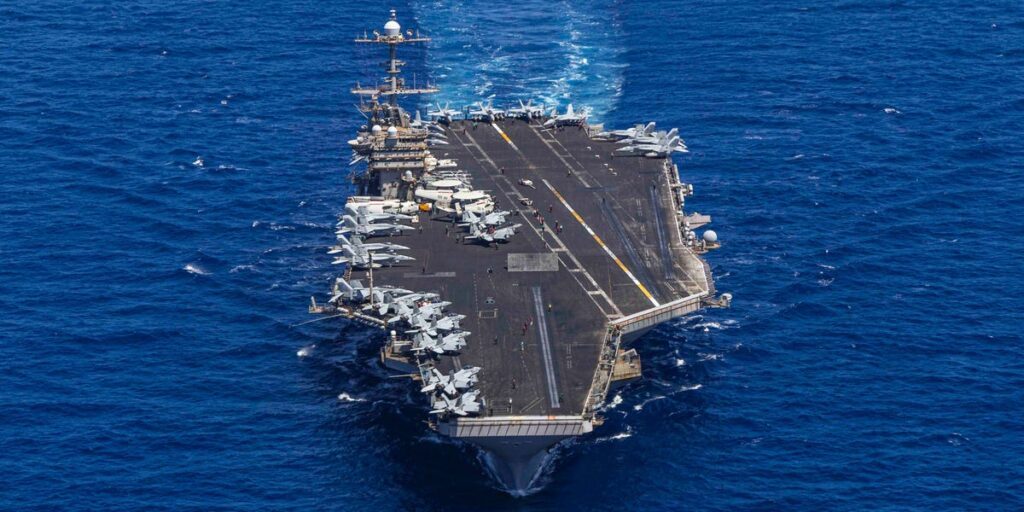 US Aircraft Carrier’s Hard Turn to Avoid Enemy Fire Sent Jet Overboard US Aircraft Carrier’s Hard Turn to Avoid Enemy Fire Sent Jet Overboard