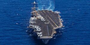 US Aircraft Carrier’s Hard Turn to Avoid Enemy Fire Sent Jet Overboard US Aircraft Carrier’s Hard Turn to Avoid Enemy Fire Sent Jet Overboard