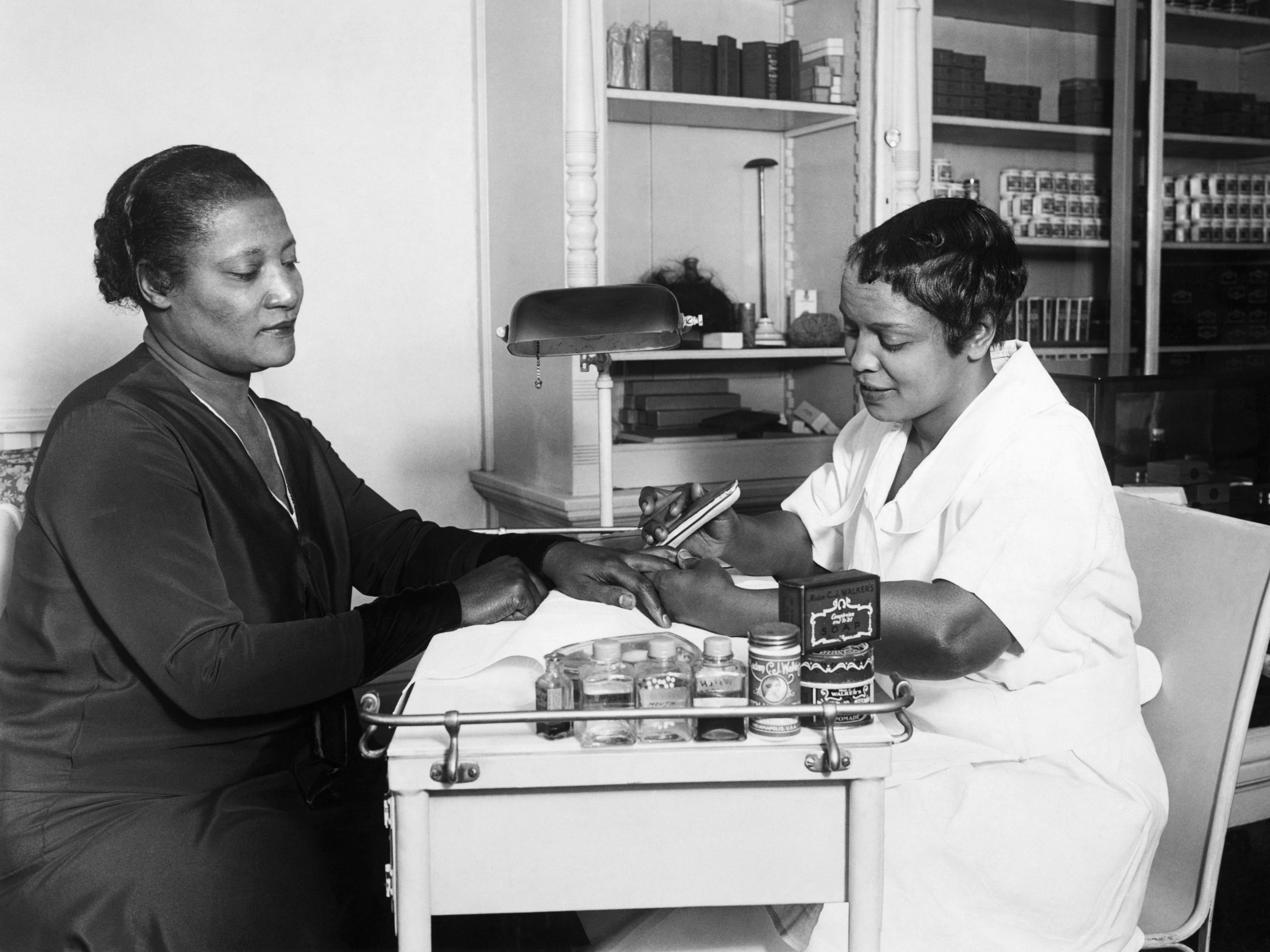 A'Lelia Walker, daughter of Madame C.J. Walker, getting her nails done in the 1920s.