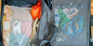 I took a 7-day cruise with carry-on luggage and a backpack. See everything on my packing list and how I organized it all.