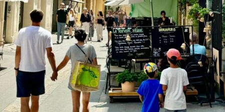 My family moved from California to a small town in France. We can save money and work less to afford our lifestyle here.