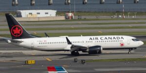The front of an Air Canada plane was wrecked at LaGuardia after it collided with a vehicle while taxiing