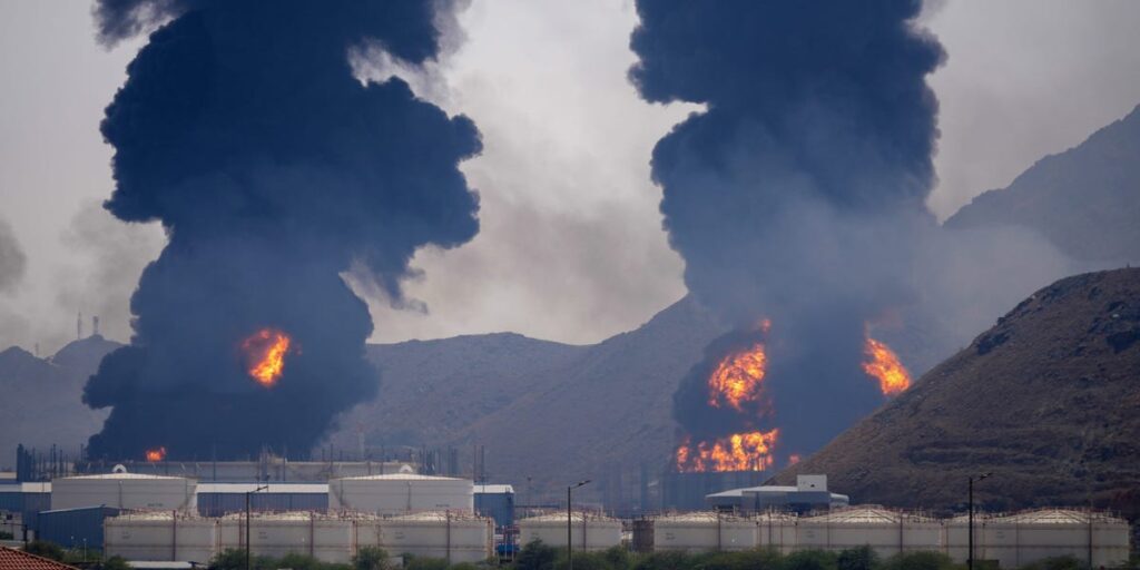 Photos show a major fire at a key UAE oil port, a day after the US struck a major Iranian depot