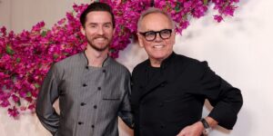 Meet the 31-year-old set to take over Wolfgang Puck’s culinary empire. He got his start washing dishes at 12.