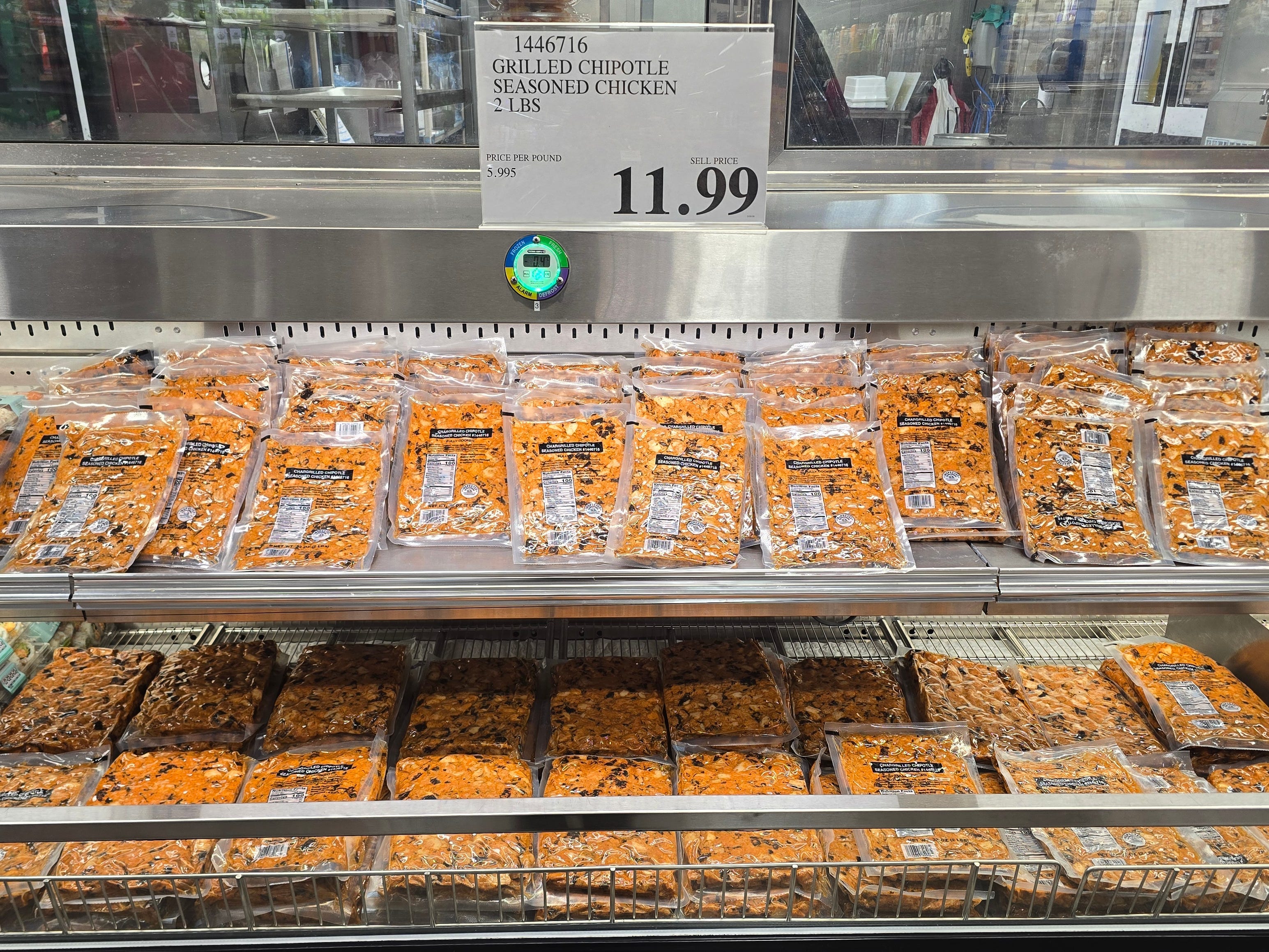 Packages of Chipotle-seasoned grilled chicken on display at Costco.