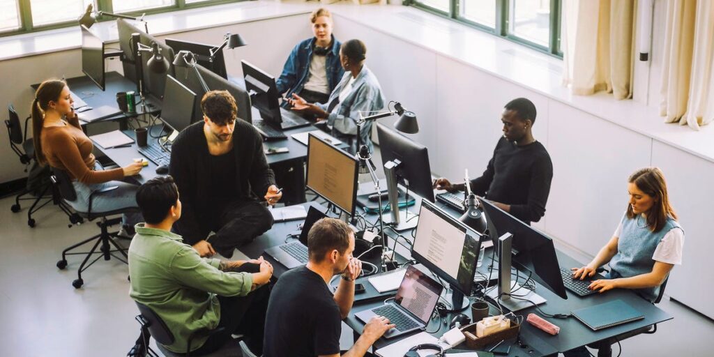 A tech worker coalition is piloting a basic income program for AI job losses