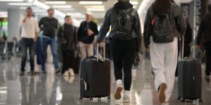 More Americans are ditching summer vacations, but travelers still going away are upping their spending