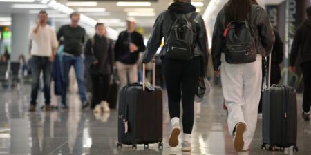 More Americans are ditching summer vacations, but travelers still going away are upping their spending