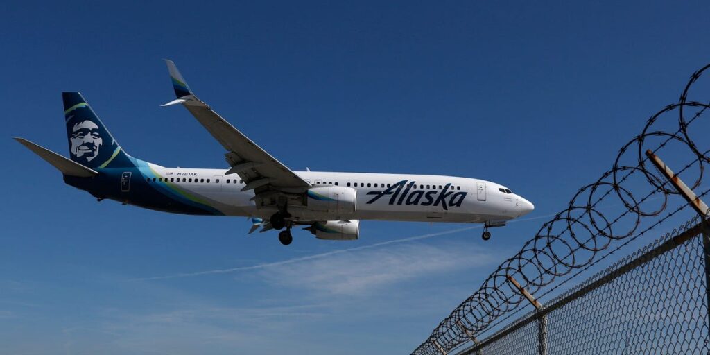Airlines are absorbing up to 50% of surging jet fuel costs. Alaska is still betting on premium international flights