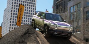 RJ Scaringe said there are 2 big reasons Rivian’s new R2 doesn’t look like a Tesla Model Y dupe