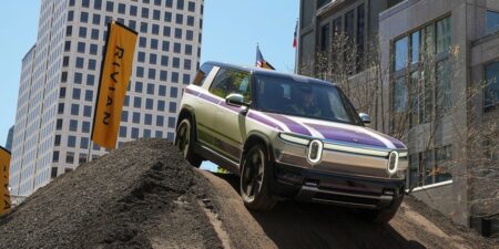 RJ Scaringe said there are 2 big reasons Rivian’s new R2 doesn’t look like a Tesla Model Y dupe