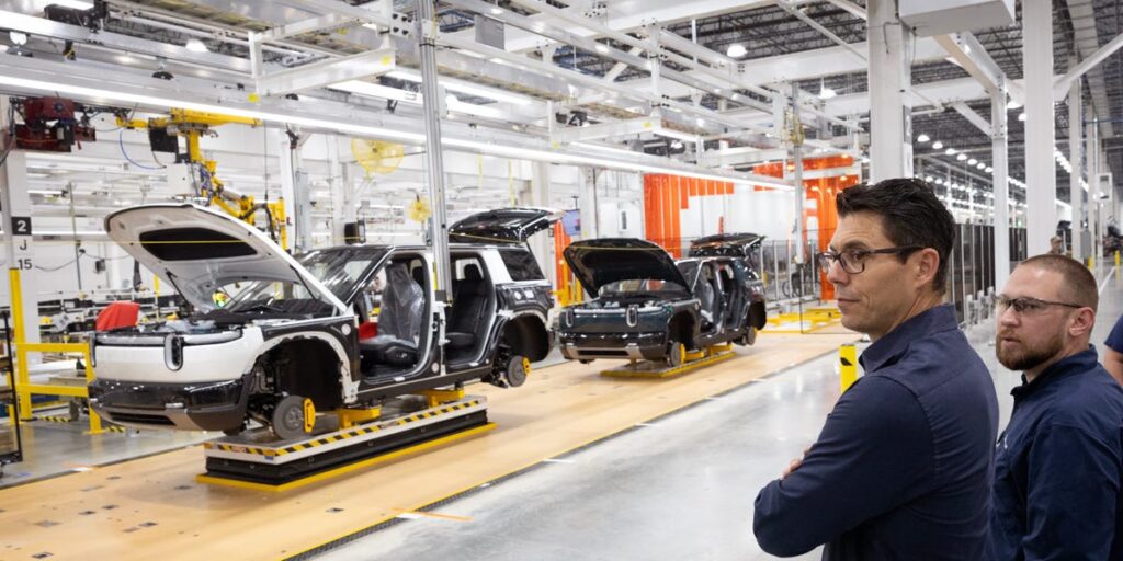 Rivian trims its workforce as the EV maker pursues profitable growth Rivian trims its workforce as the EV maker pursues profitable growth