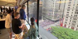 The hottest office perk in NYC today: a front-row view of the Knicks parade
