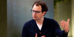 Anthropic CEO says an ‘intrinsic’ feature of AI may be fewer jobs. His answer? Redistribute the upside.