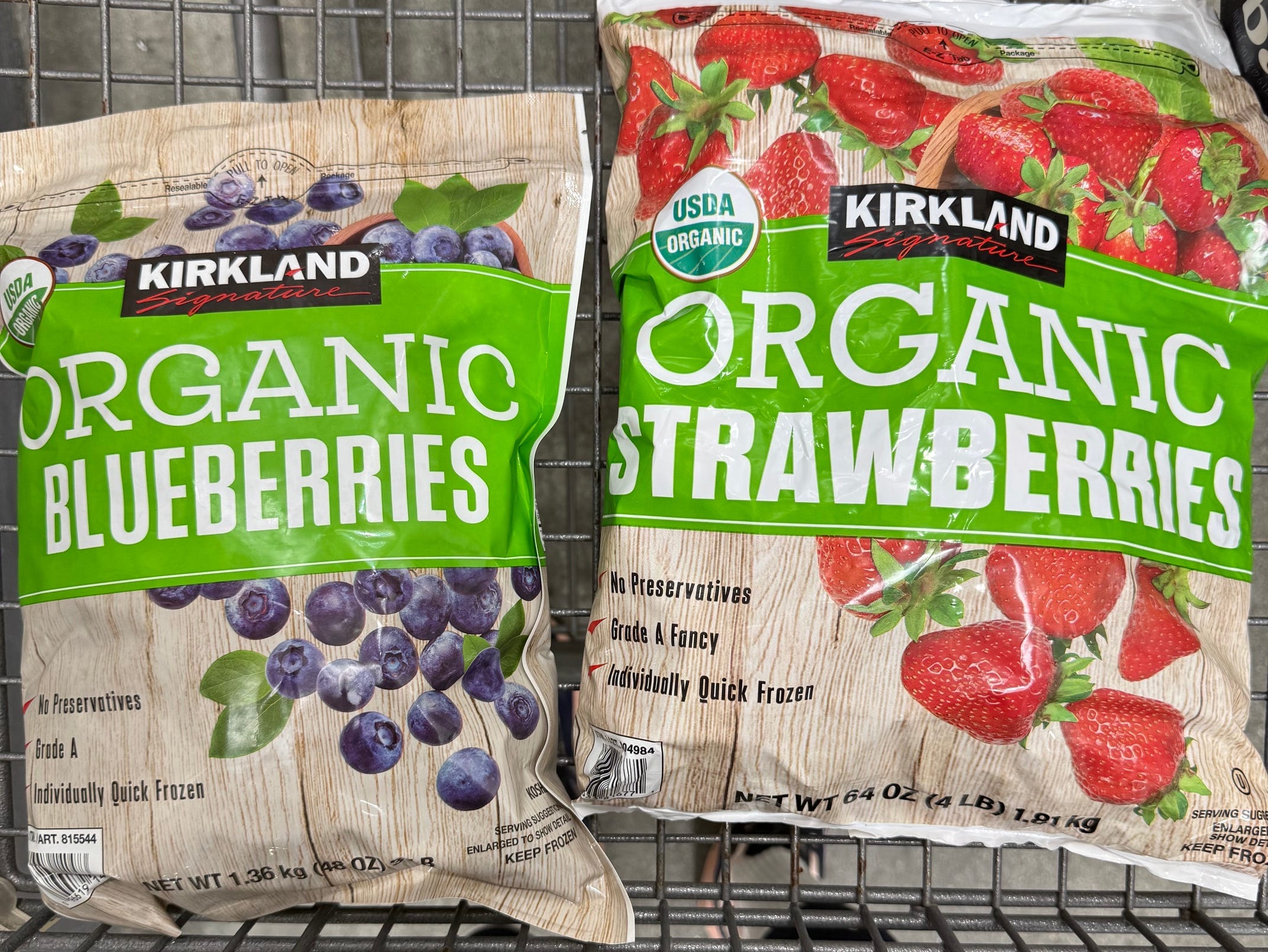 Kirkland Signature organic frozen blueberries and frozen strawberries.