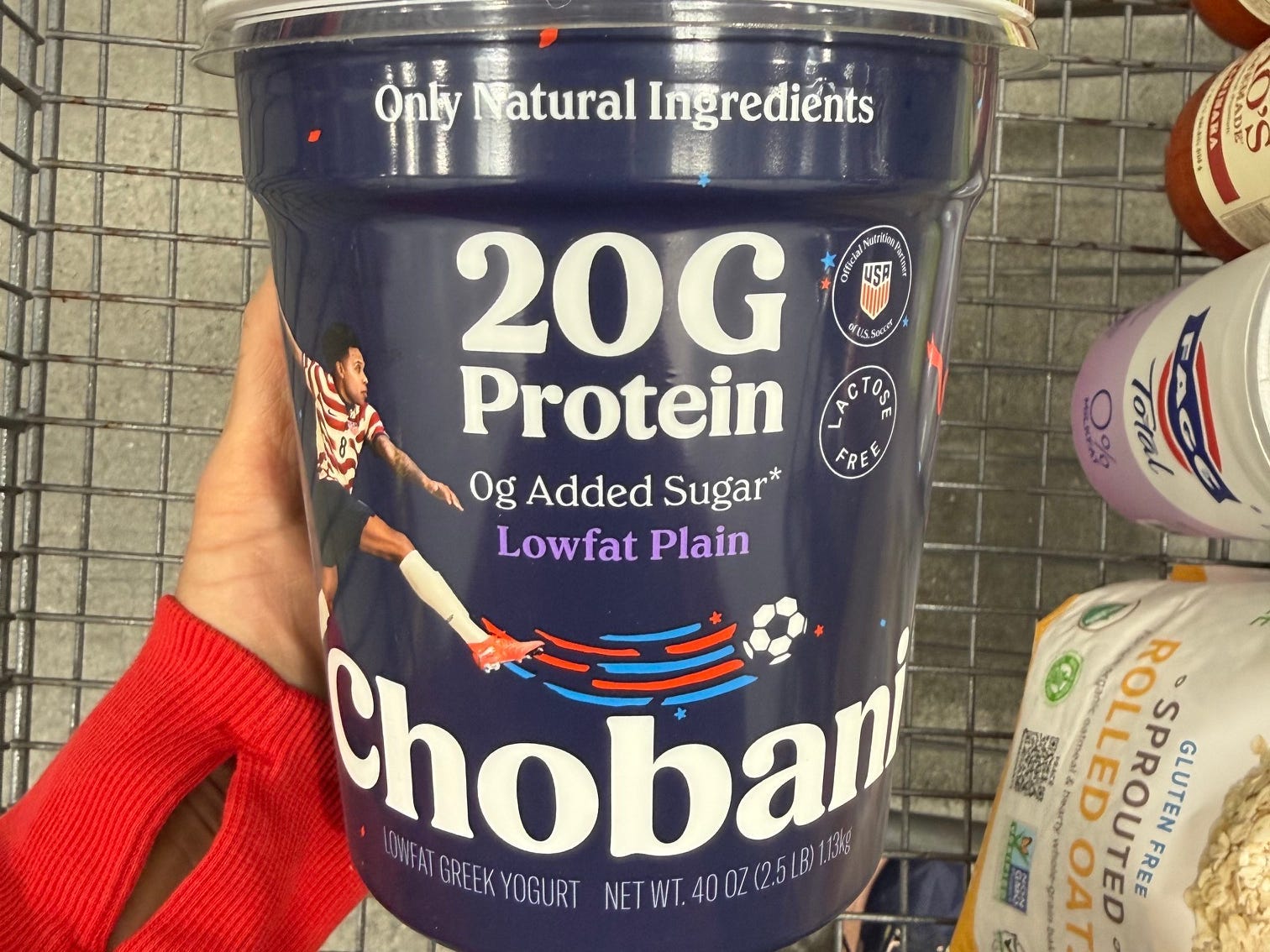 A tub of Chobani low-fat plain yogurt.