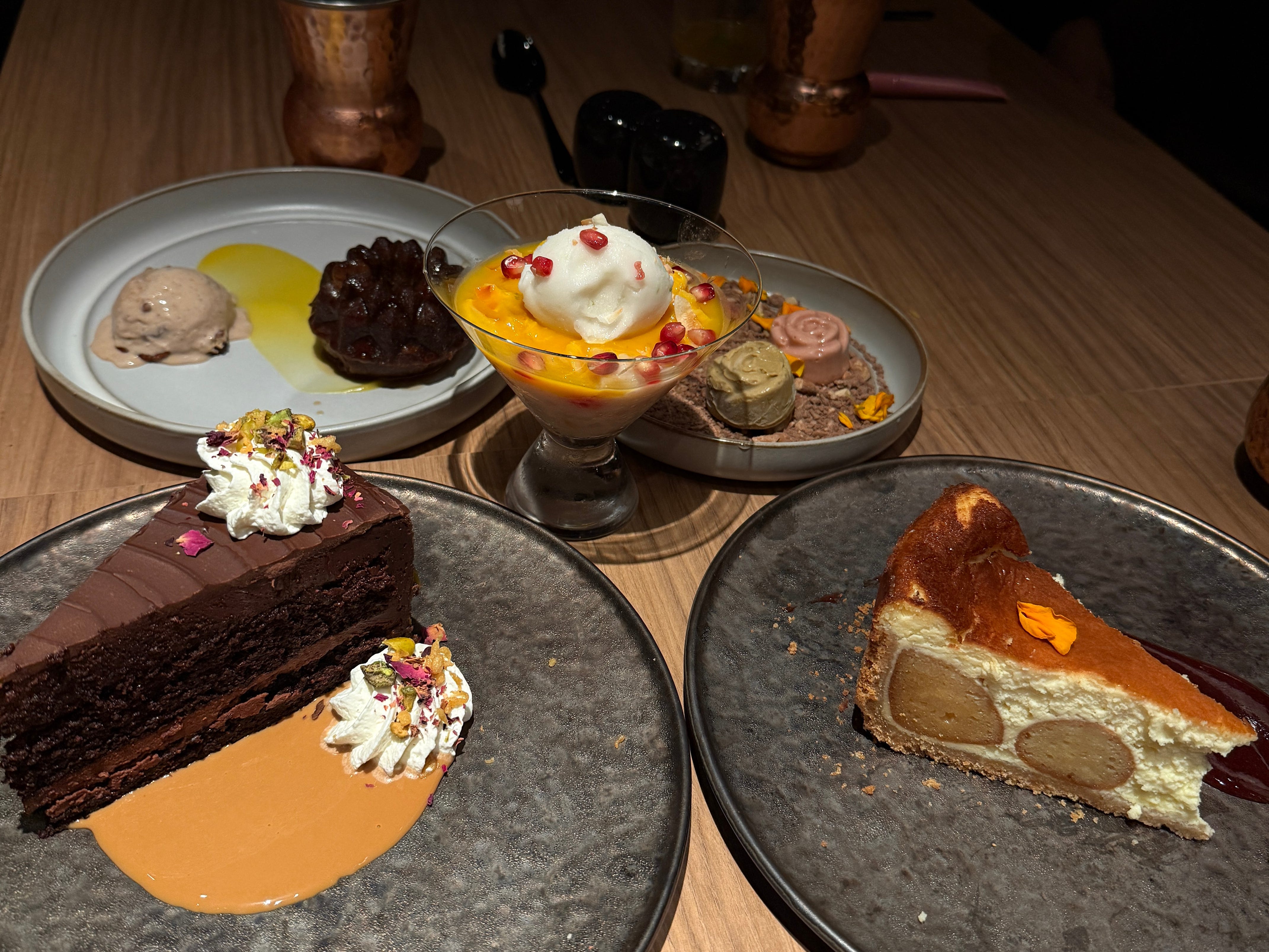 A variety of desserts at an Indian restaurant aboard a Virgin Voyages cruise ship.
