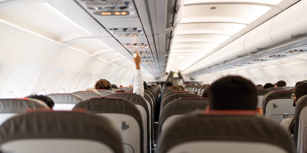 4 mistakes to stop making on a plane, according to an etiquette coach