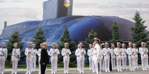 Russia replaced its once-grand Navy Day parade with a shipless event and a giant poster of a submarine