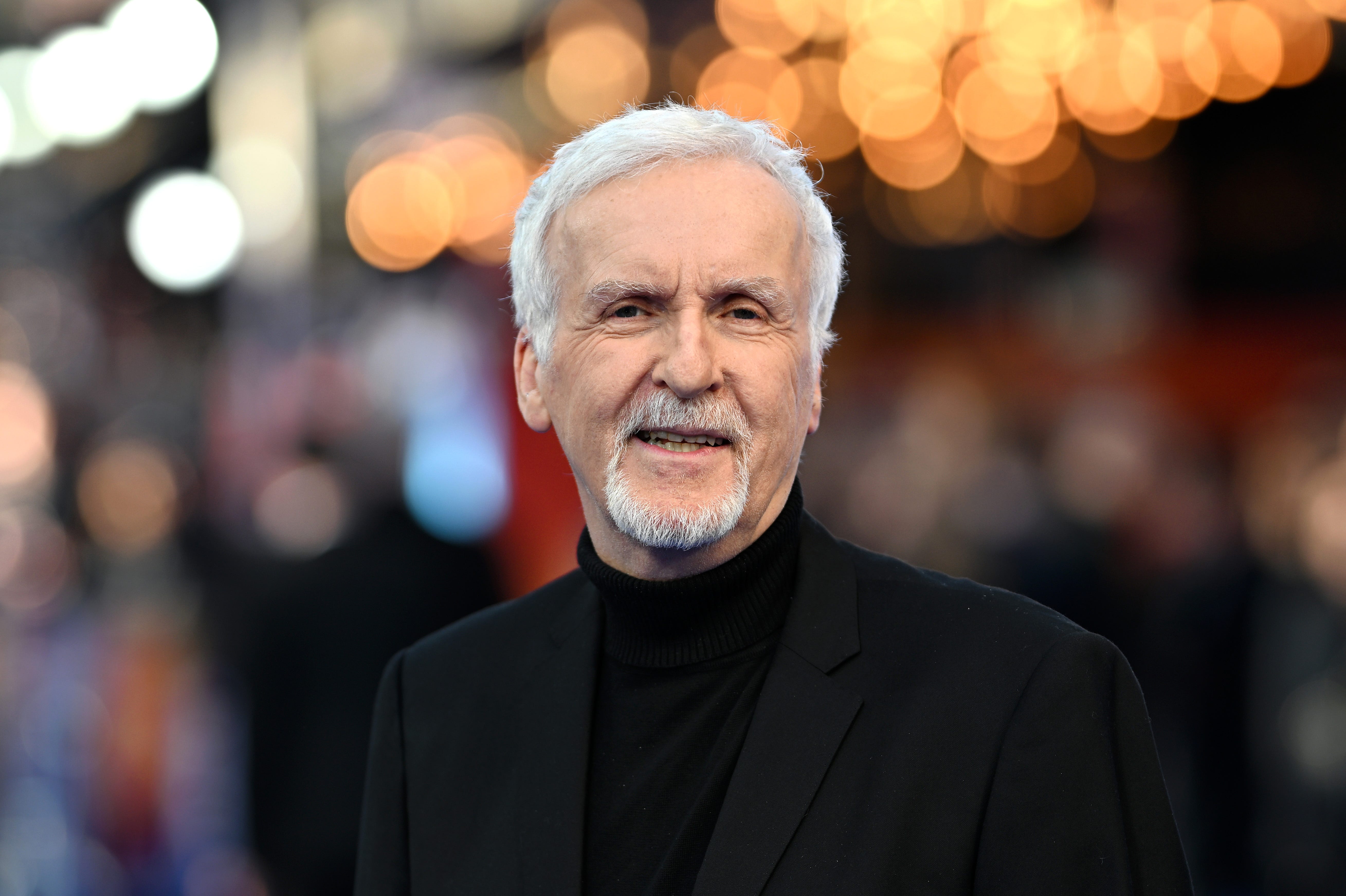 James Cameron in a black jacket and turtleneck