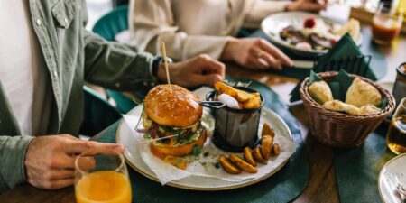 4 things you should never order in front of your boss or coworkers, according to an etiquette expert