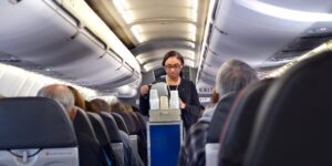 American Airlines is reversing its bet against seatback screens