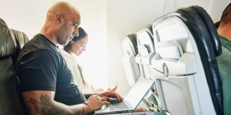 Elon Musk’s Starlink is dominating in-flight WiFi. Here’s which airlines have it — and how to check if your plane does.