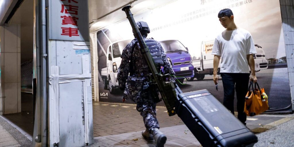 Taiwan’s troops are training to fight China in ordinary neighborhoods as people go about their days