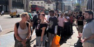 The hottest thing to do in London today is wait in line for solar eclipse glasses