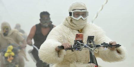 19 surreal photos show the mud, chaos, and glamour of Burning Man