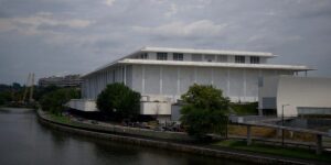 The Kennedy Center’s board voted to close until Trump’s name is added. Here’s a look at the history behind the landmark.