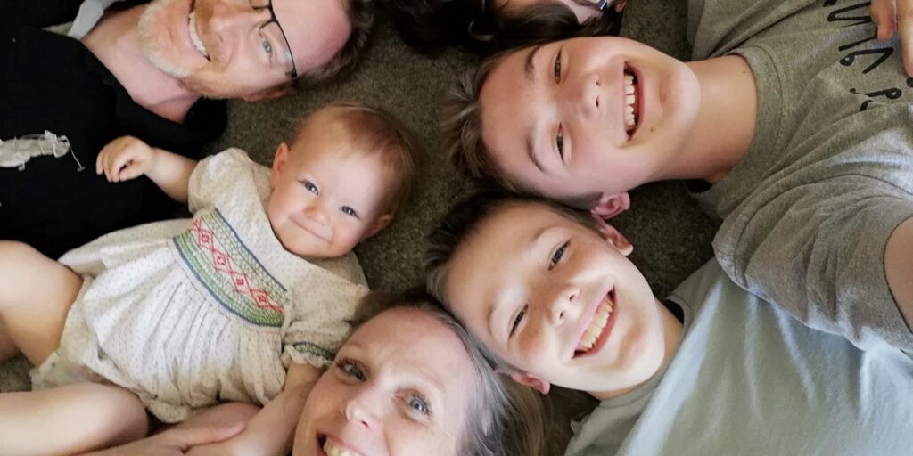 My partner and I had 4 boys between us. Our surprise daughter brought our blended families together.